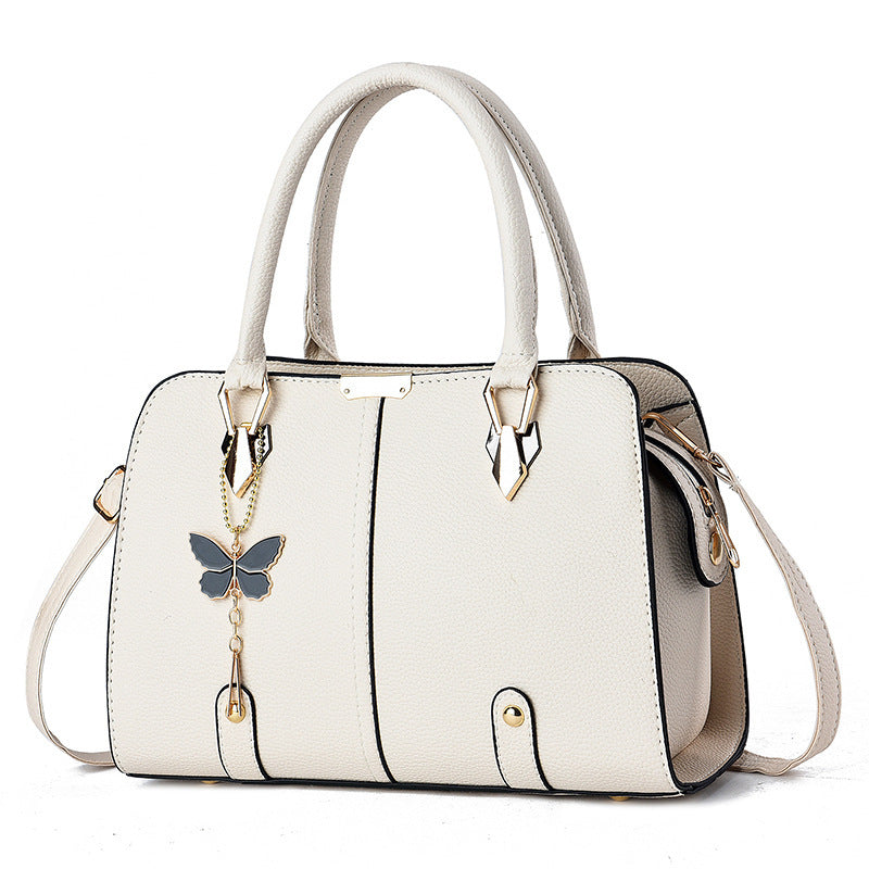 Women's Fashionable PU Leather Handbag With Butterfly Pendant