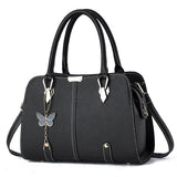 Women's Fashionable PU Leather Handbag With Butterfly Pendant